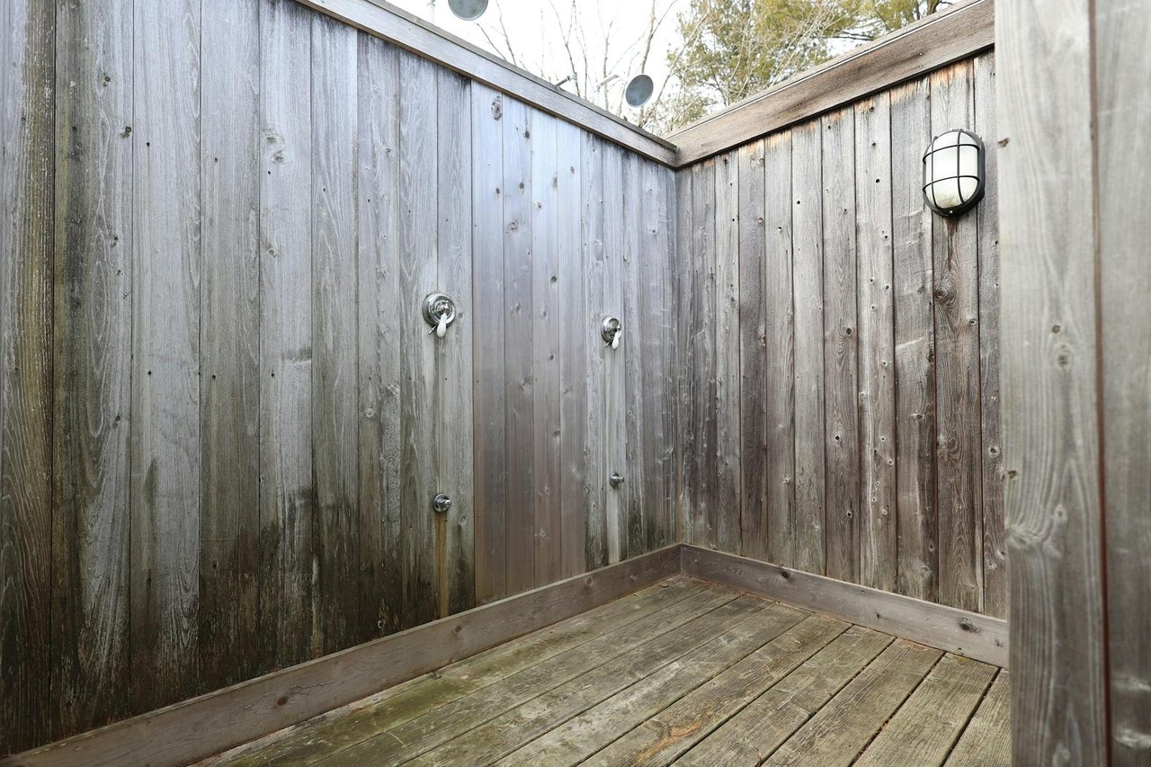 Two spacious outdoor showers/changing rooms