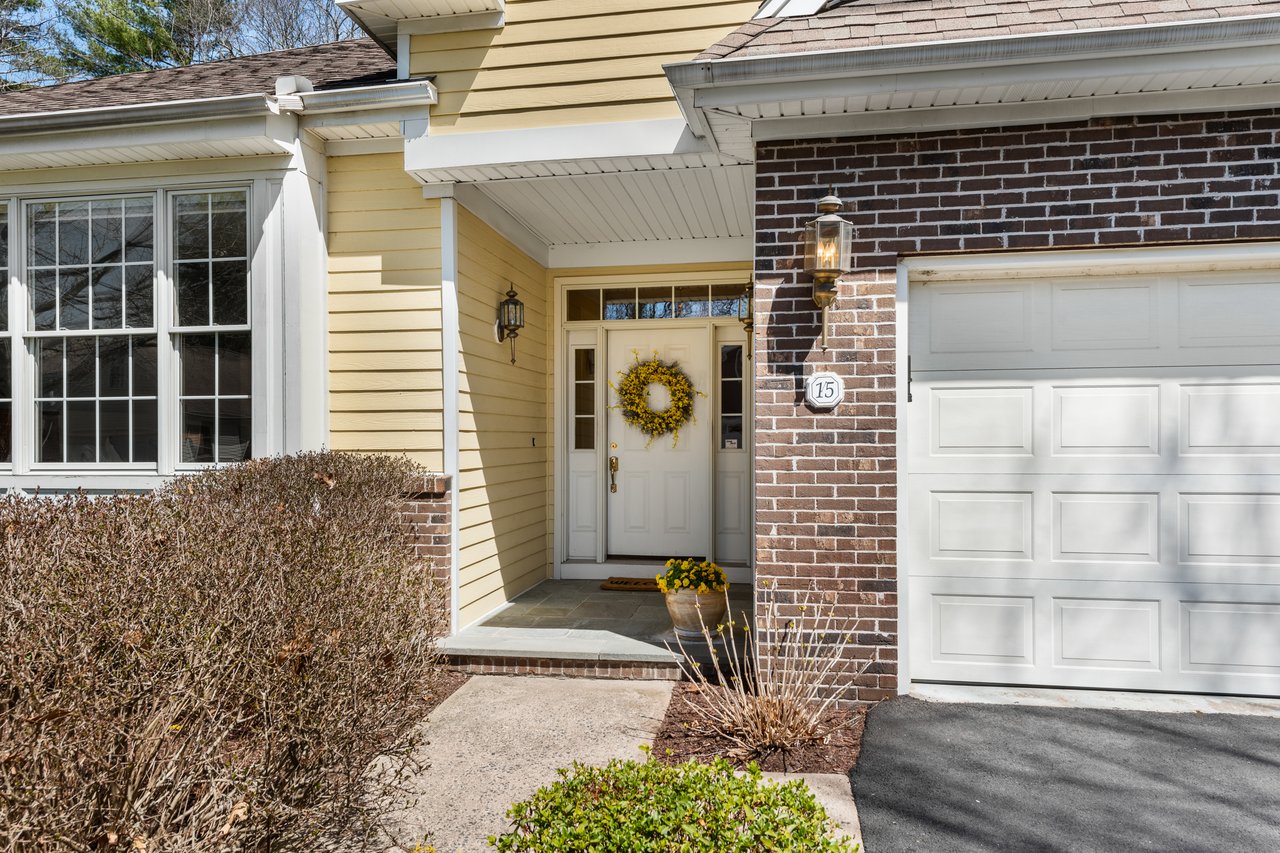 Inviting blue stone patio front porch will greet you