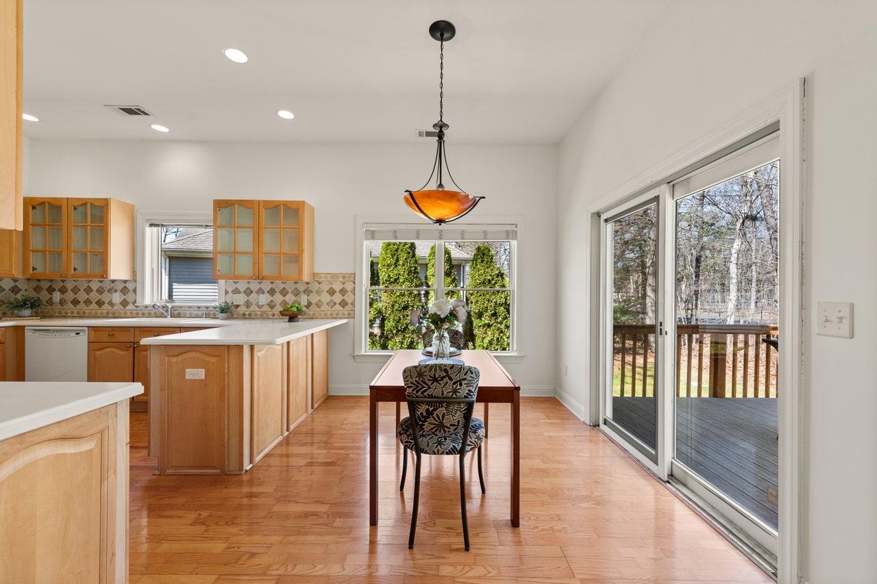 Sliders off the breakfast nook lead to a private deck