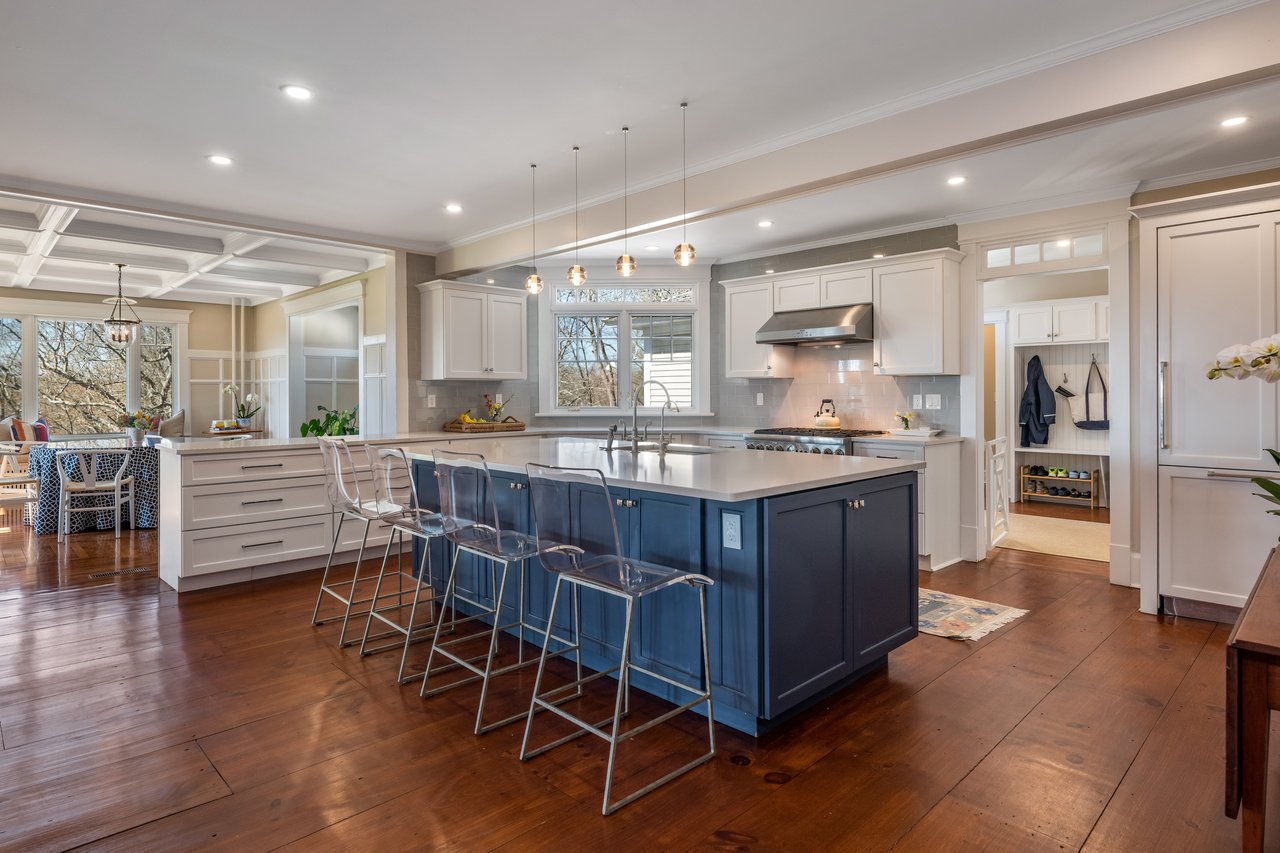 In the center of this kitchen is the Island with storage on both sides.