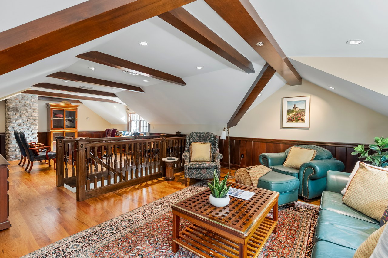 Office suite with handsome beams and hardwood floor