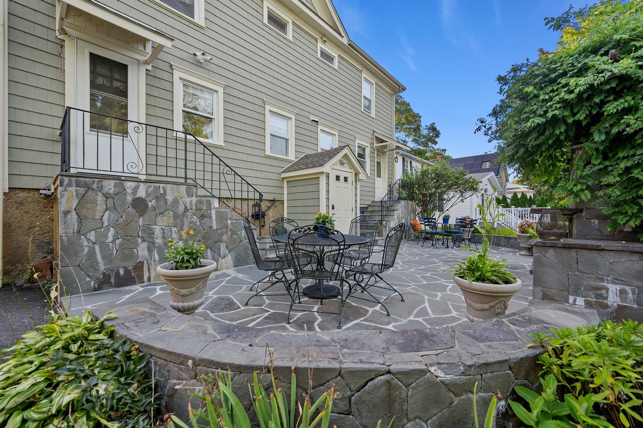 Shared rear patio with fireplace	