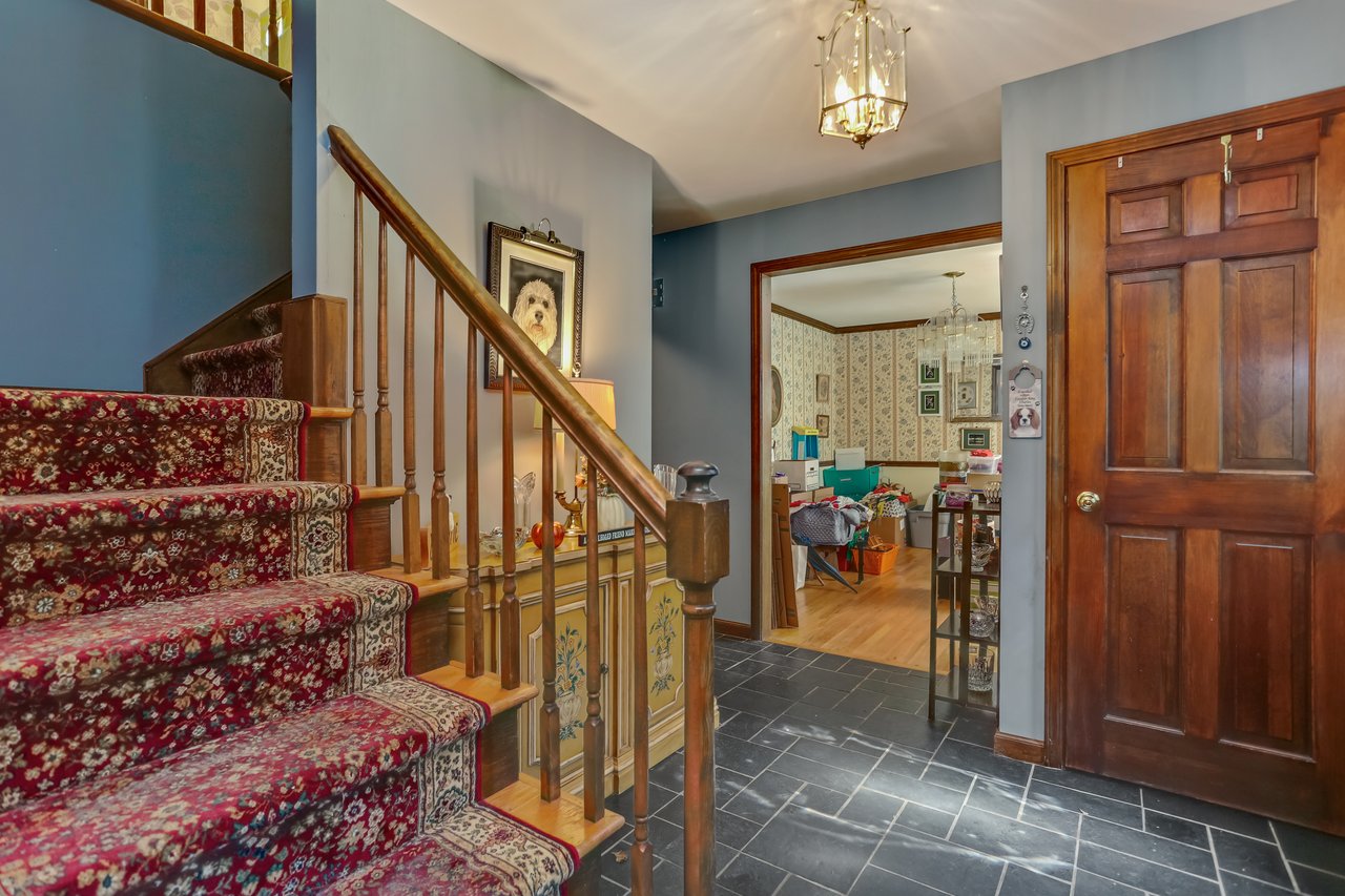 View toward the Kitchen and Formal Dining Room.	