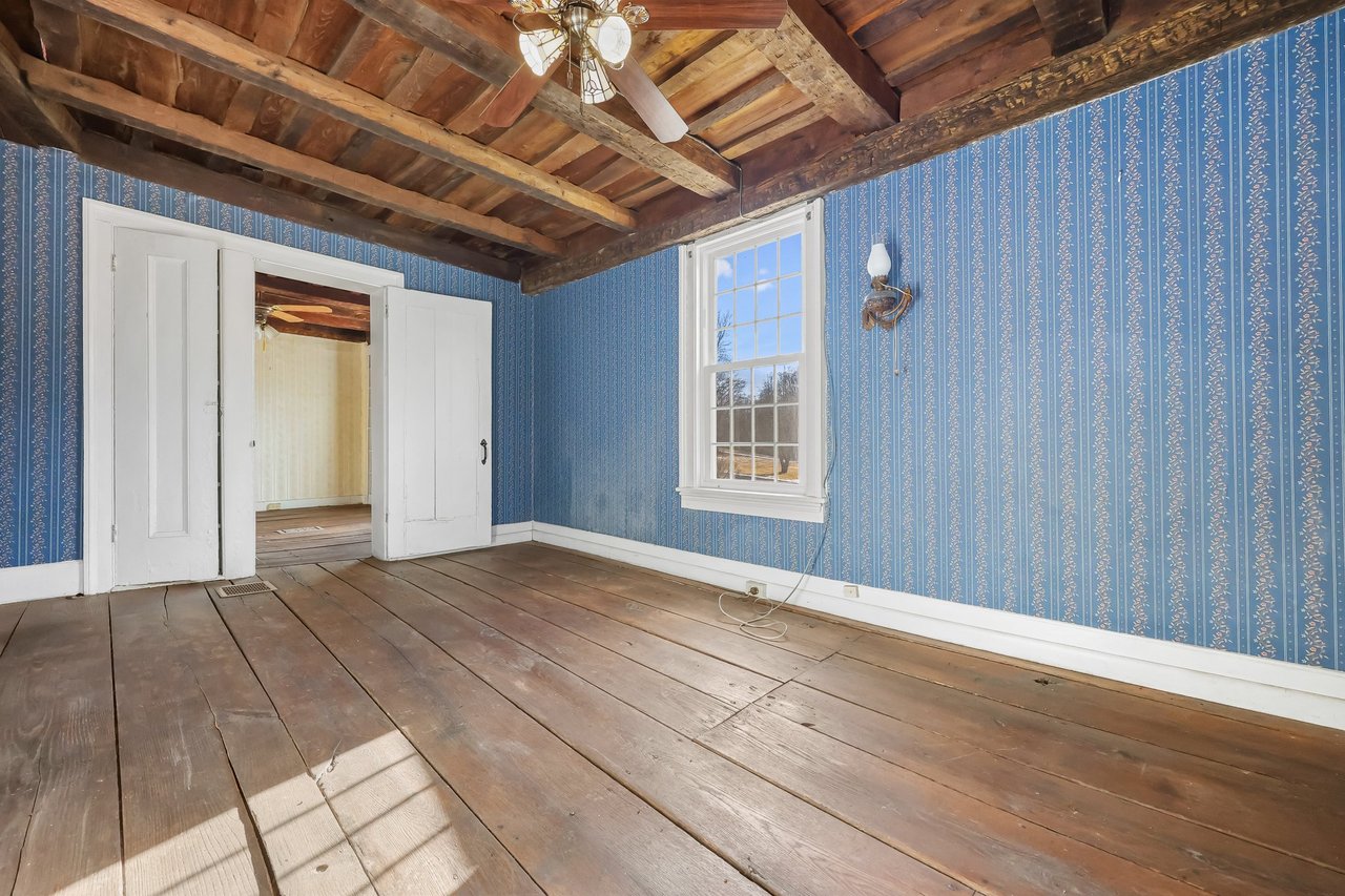 The study without the staging. Note the beams and flooring.