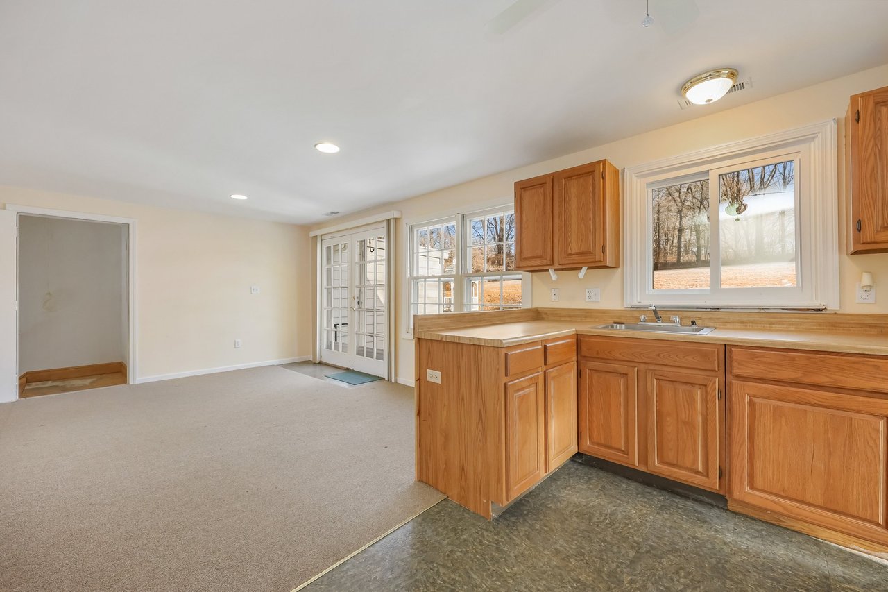 The kitchen is open to the living room. It's an easy light space to enjoy.