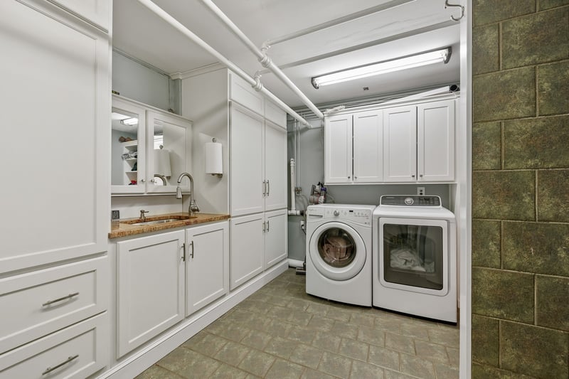 Apt B - Lower level laundry room and storage closet space