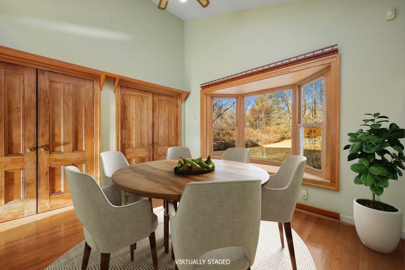 Enjoy casual dining in the space in the kitchen by the bay window.