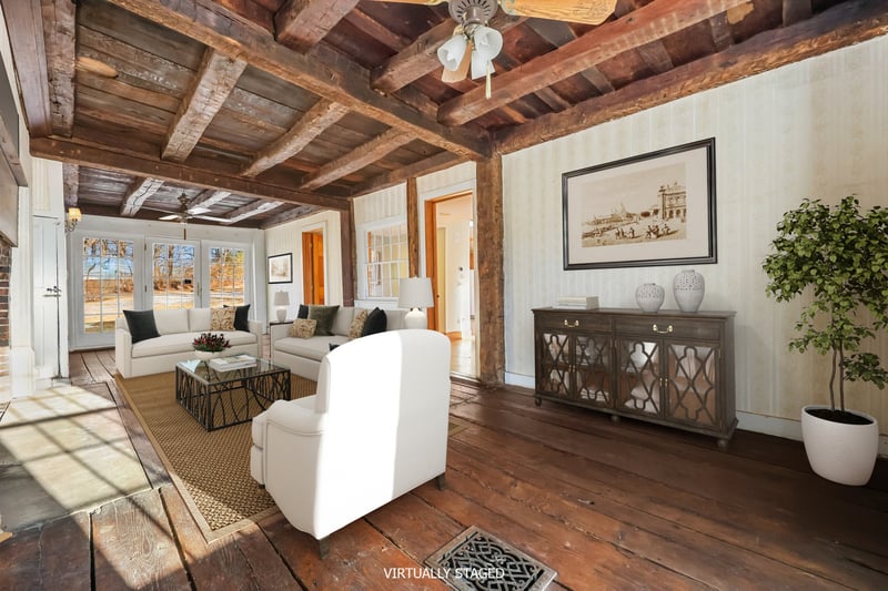 The family room is gracious and light filled with French Doors at one entire wall.