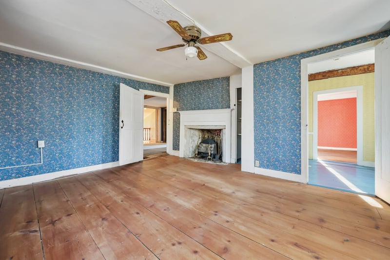 Graciously sized bedroom in the original part of the home.