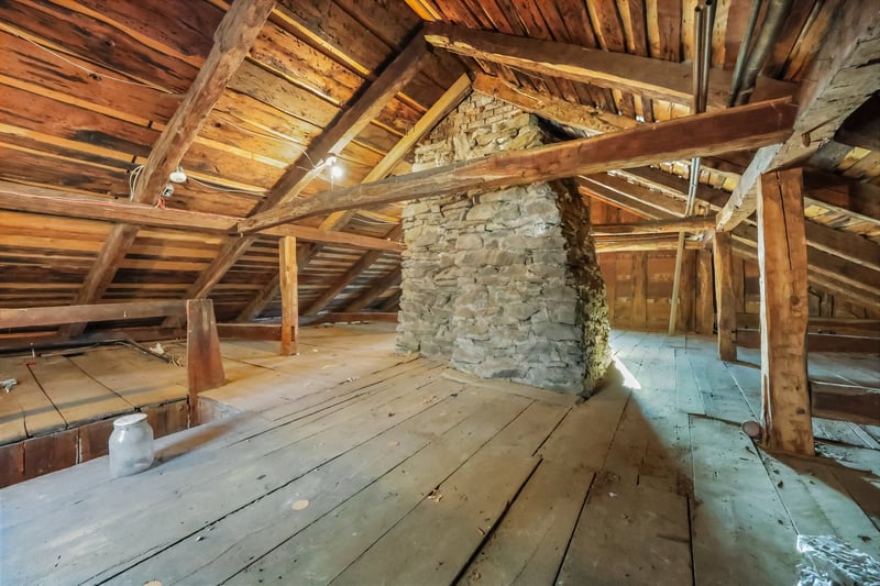 The walk up attic is large, open and great for storage.